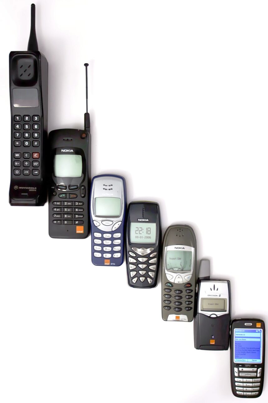 A row of mobile phones showing the evolution of handset design